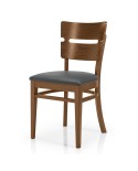 Silla de madera con asiento tapizado, ideal para hostelería interior y hogar.