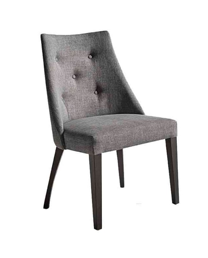 Silla tapizada con capitoné y patas de madera de haya barnizadas. Ideal para hogar y hostelería