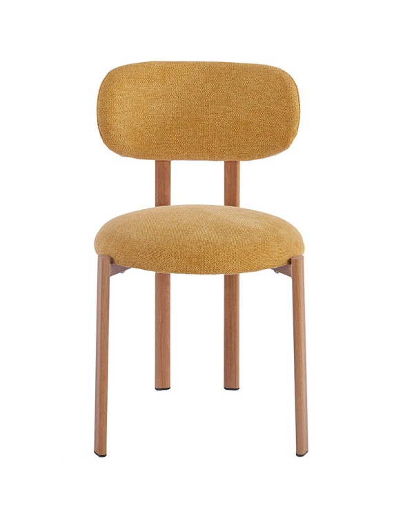 Silla de acero tapizada en mostaza para proyectos de interiorismo.